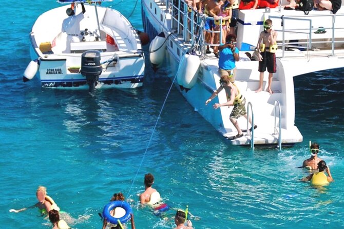 Party Catamaran and Snorkeling Tour in Montego Bay - Montego Bay’s party boat, not a quiet reef cruise