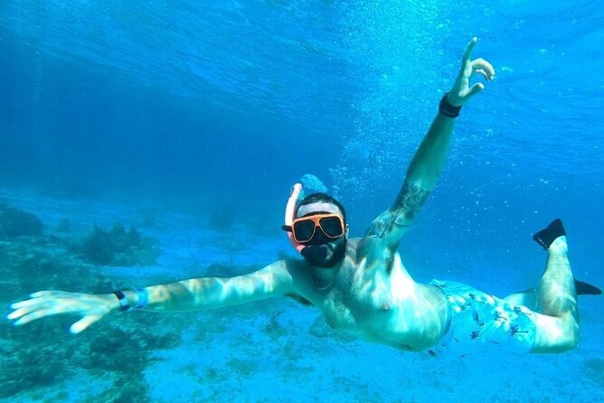 Party Catamaran Cruise with Open Bar and Snorkeling Montego Bay - Music, dancing, and the crew’s role