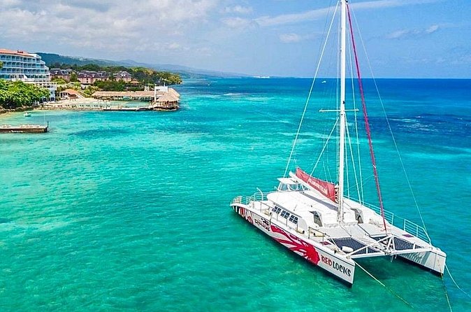 Party Catamaran Cruise with Open Bar and Snorkeling Montego Bay - Private transportation versus a shared cruise