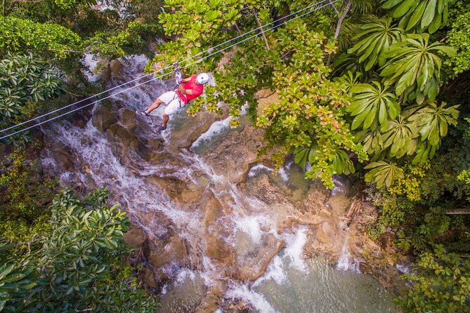 Party Catamaran with Dunns River Climb from Montego Bay - Climbing the 600-foot Dunn’s River cascade