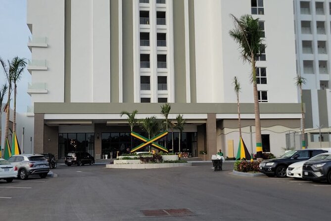 Private Airport Transfer Riu Aquarelle & Excellence Oyster Bay - The Falmouth sign photo stop
