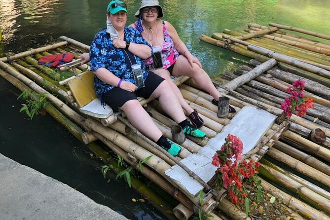 Private White River Bamboo Rafting & Limestone Massage Ocho Rios - Getting fitted for the raft and life vest