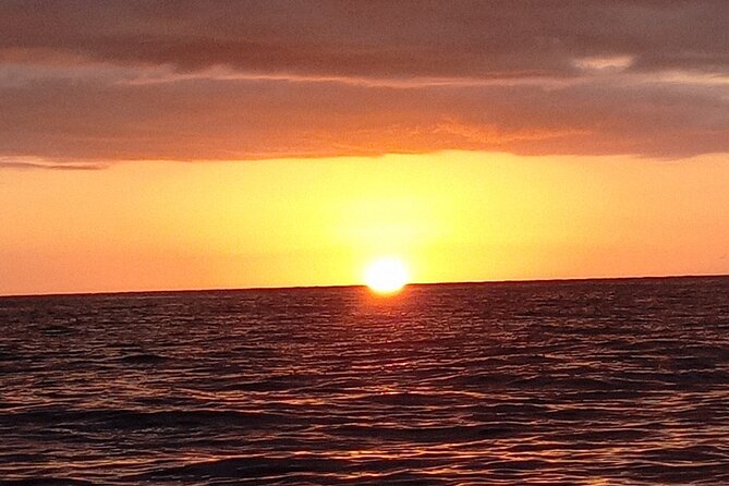 Rick's Cafe Sunset Cruise - Passing Seven Mile Beach From the Water