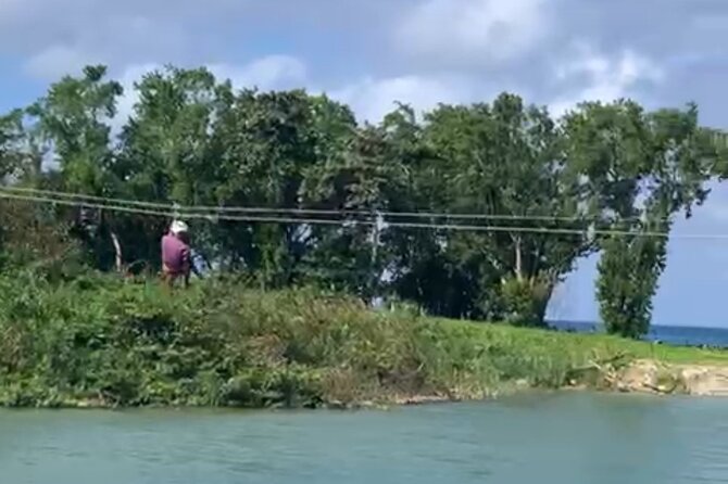 Rio Nuevo Village Ziplining - A short flight over the Rio Nuevo River