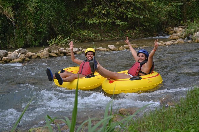 River Rapids River Tubing Adventure Tour from Falmouth - Sliding into the rainforest current