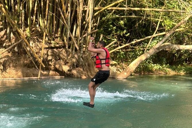 River Rapids Tubing and Beach Visit with Private Transportation - Paddling toward the beach