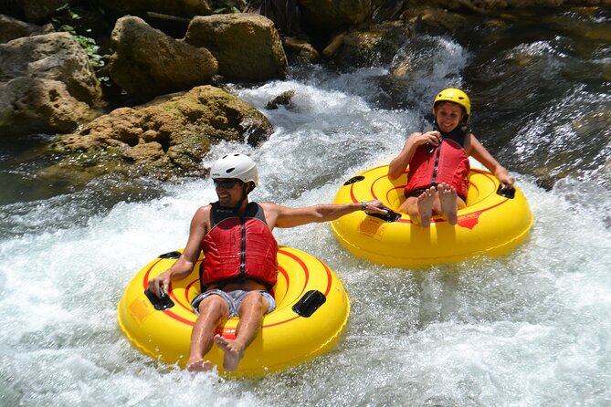 River Rapids Waterfalls Tubing and Beach Adventure with Transport - A gentle start on Jamaica’s Rio Bueno