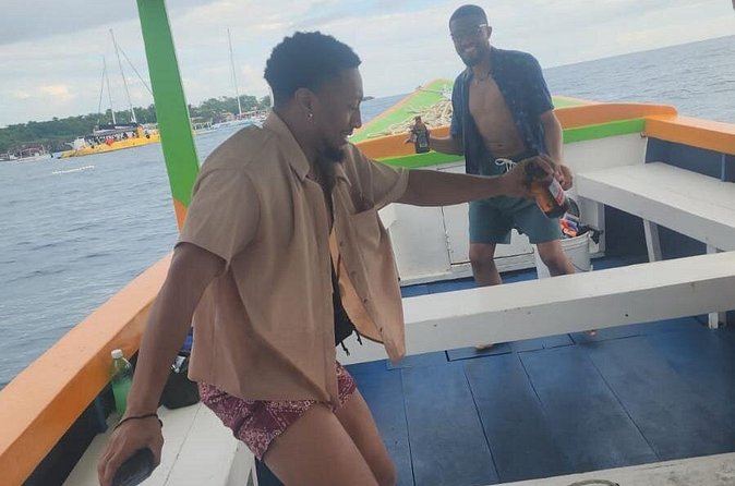 Sunset Booze Cruise in Negril - Swimming and cliff jumping at Rick’s Cafe