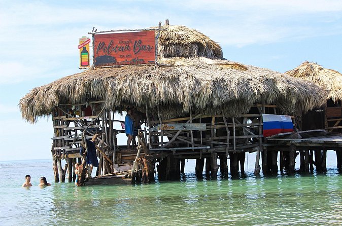 YS Falls, Black River Safari, and Floyd's Pelican Bar Day-Trip (Transportation) - Reaching Floyd’s Pelican Bar by fishing boat