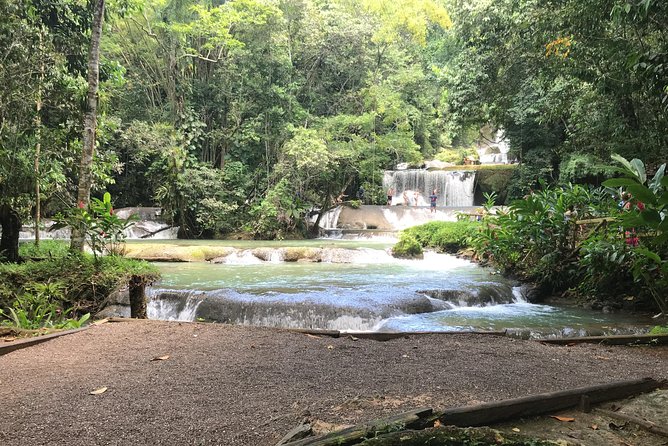 YS Falls Private Full-Day Adventure Tour with Pickup - Seven waterfalls, gardens, and natural pools