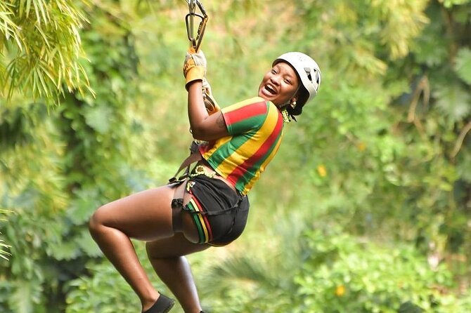 Zipline, Dunn’s River Falls, Bamboo Rafting & Horseback Ride Tour - Bamboo rafting at White River and Lethe Village